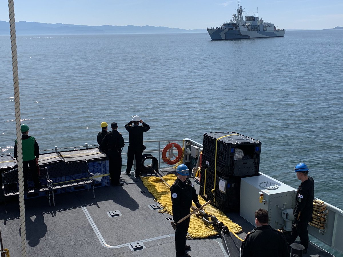 Sailors return on deck aboard both ships and get ready to return the gear. First, REG heaves in her cable to get the towing hawser on deck14/17 – at  Strait of Juan de Fuca