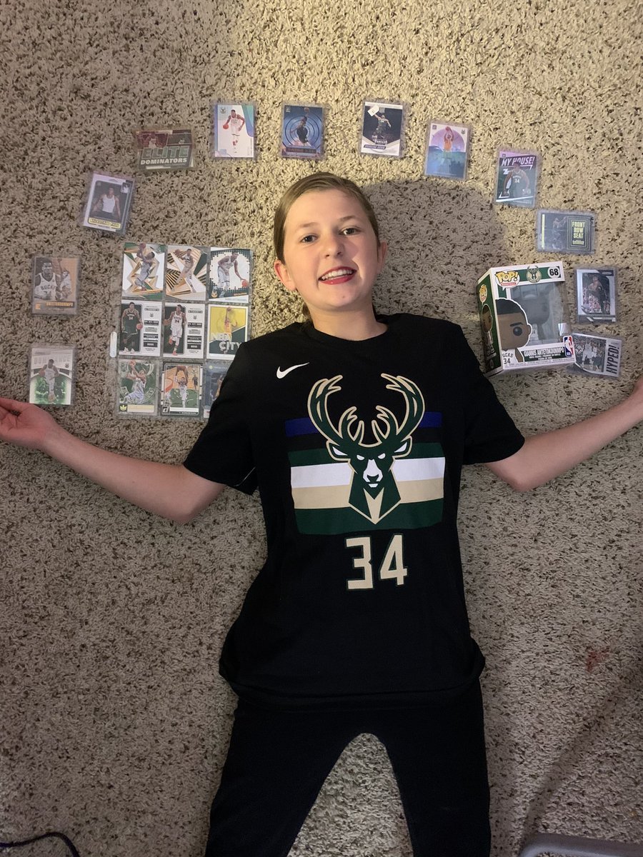BuckeyeStacey's tweet photo. @Giannis_An34 Maya your # 1 fan adding to her Giannis Antetokounmpo collection! 🏀 #misswatchingyouplay https://t.co/WsEOi0tUHB