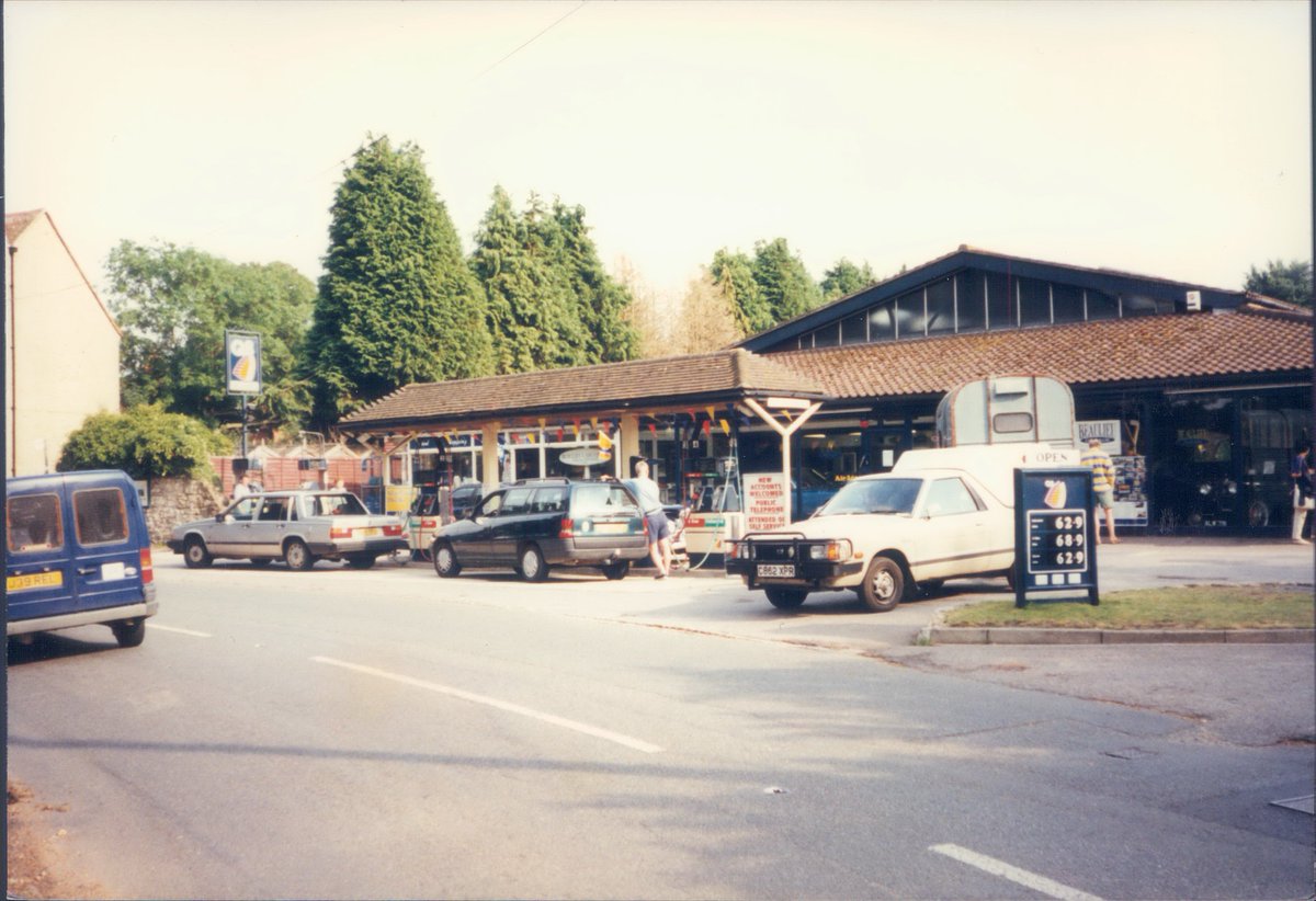 Day 113 of  #petrolstationsQ8Beaulieu Garage, Beaulieu, Hampshire 1997  https://www.flickr.com/photos/danlockton/16078080009/  https://www.flickr.com/photos/danlockton/16262382261/A beautiful location, next to the Beaulieu River, with New Forest ponies grazing on the verge opposite. The 'pub sign' variant of the Q8 logo is a nice touch