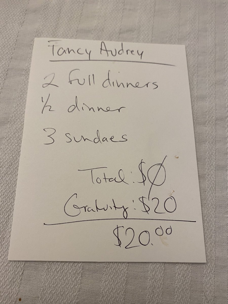 At the end of the meal, Audrey left again, and the waitress came back and handed me a bill. I asked if I could leave a cash tip but was told that all I needed to do was sign it, which I did.