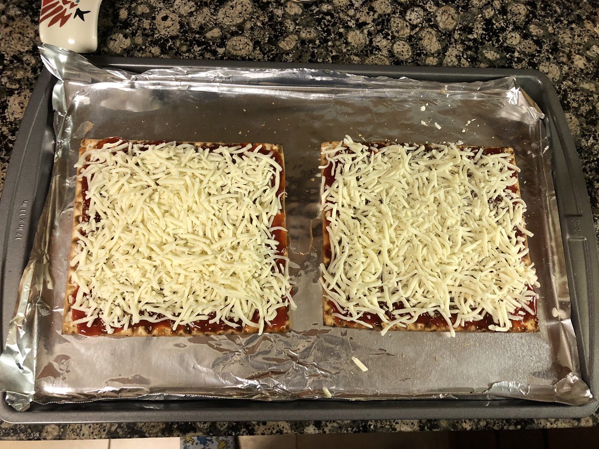 5. Sprinkle mozzarella cheese on top. Make sure you cover the entire matzah. I like it cheesy!In  #Israel we use the regular cheese slices, not mozzarella and not shredded. It’s still delicious!