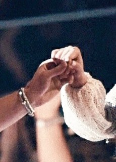 look how tiny her hands are as compared to him