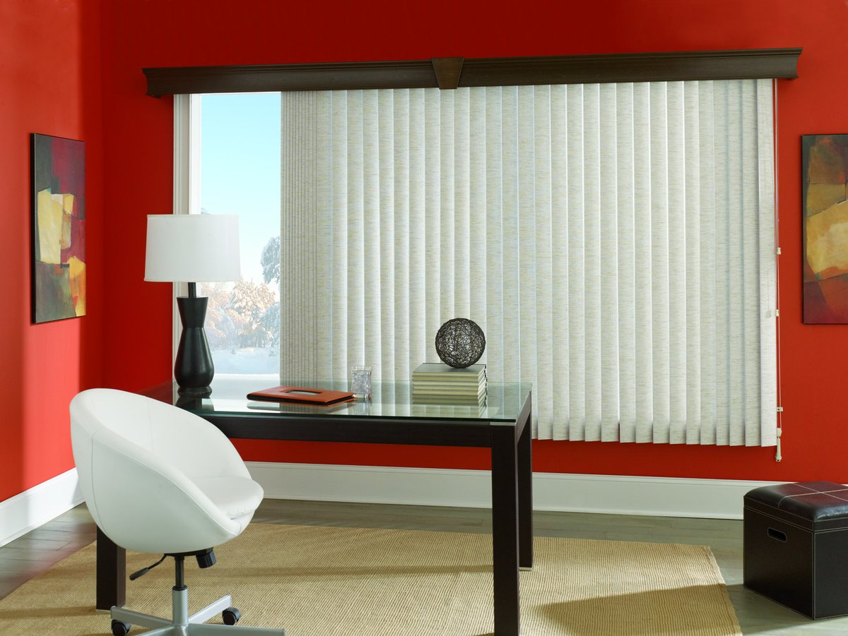 These Signature Series vertical blinds are perfect for any office or large window. You can control the light and how much privacy you need for those webinars and Zoom meetings! #blinds #office #windows #BudgetBlinds