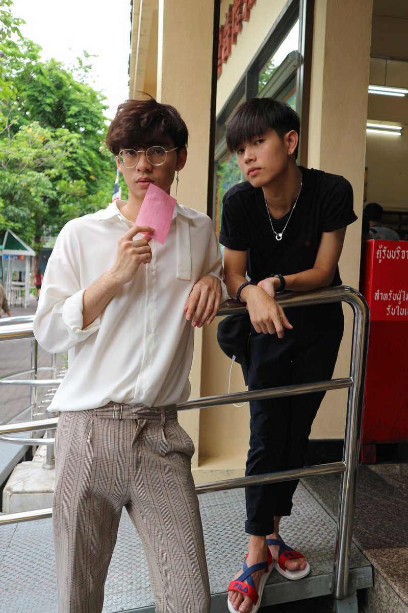 Kaownah (ft. Turbo) with rolled up sleeves ; a thread 