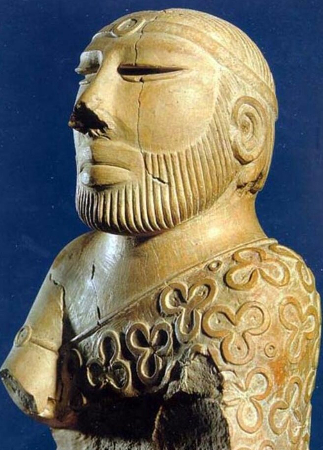 Eyes are deeply incised & may have held inlay. The upper lip is shaved & the short combed beared framed the face. The idol of priest king is of deity & was thought to be used for religious purpose . (4/4)