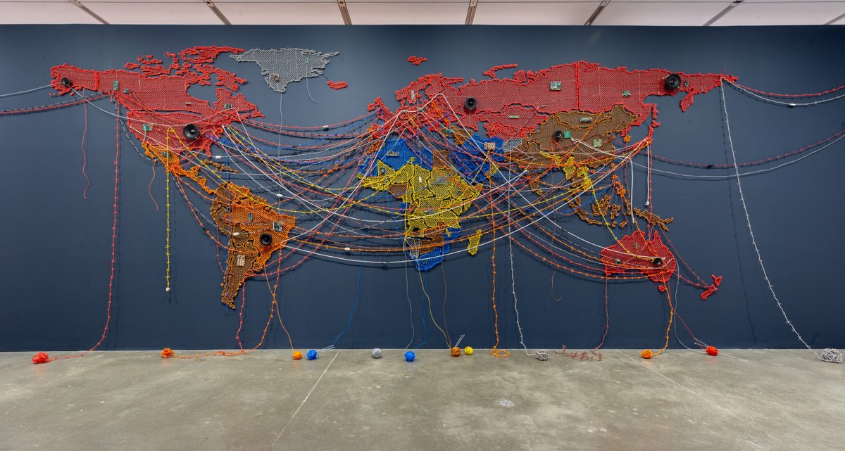 Works by multidisciplinary Indian artist Reena Saini Kallat, 2000-10s, who uses materials like rubber stamps, salt, and electrical wires to address issues like bureaucratic processes, climate change, and global migrations