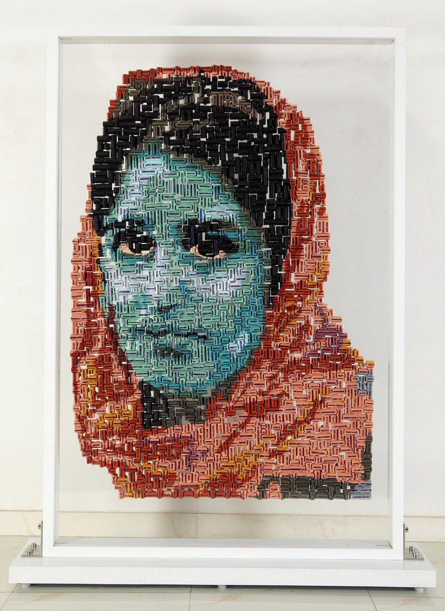 Works by multidisciplinary Indian artist Reena Saini Kallat, 2000-10s, who uses materials like rubber stamps, salt, and electrical wires to address issues like bureaucratic processes, climate change, and global migrations