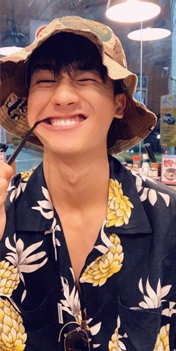 a thread of tay tawan wearing printed shirt  #Tawan_V  @Tawan_V