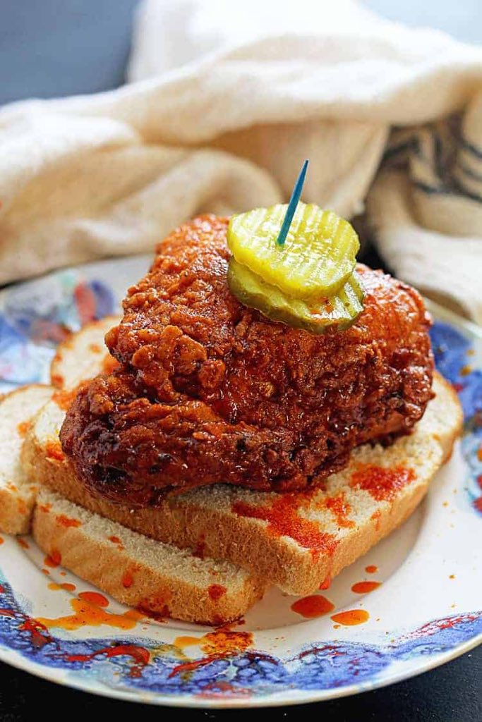 Imma start off with Nashville and the hot chicken cause yalllllllllllll that shit right there is SO DAMN GOOD. Then you have the white bread on the side and the pickles 
