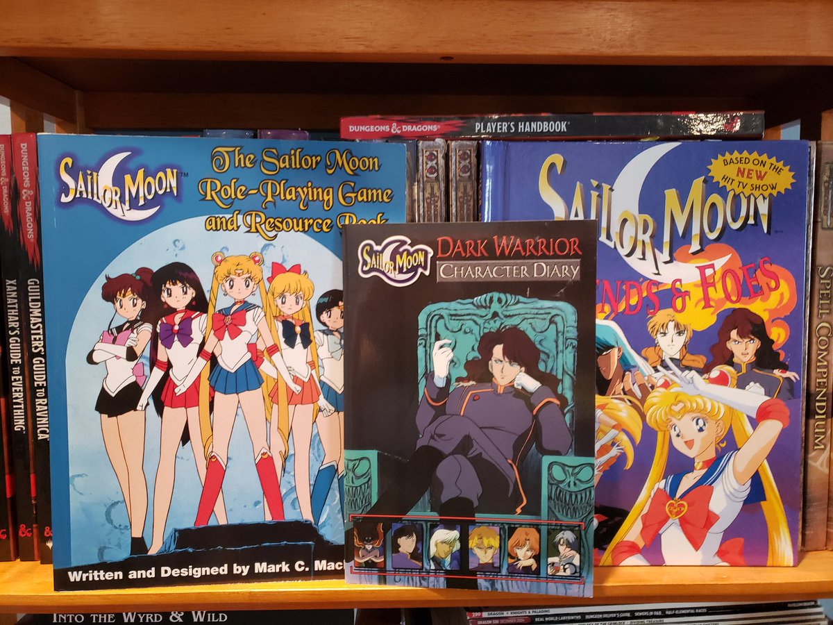 Feeling saucy. Might do a random bookshelf giveaway...Would anyone be interested in a  #sailormoon  #ttrpg package? Let's call their condition "homeshelf new" in that I bought them and never got to do anything with them.