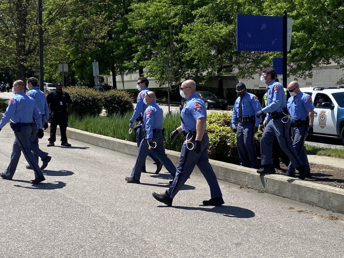 Third & final  @raleighpolice warning appears to working as much of the crowd disperses.  @WakeSheriff prison transports also arriving now, as officers also start walking through the parking lot and going to car to car.  @ABC11_WTVD  @ABCPolitics  @ABC  #abc11  #coronavirusNC