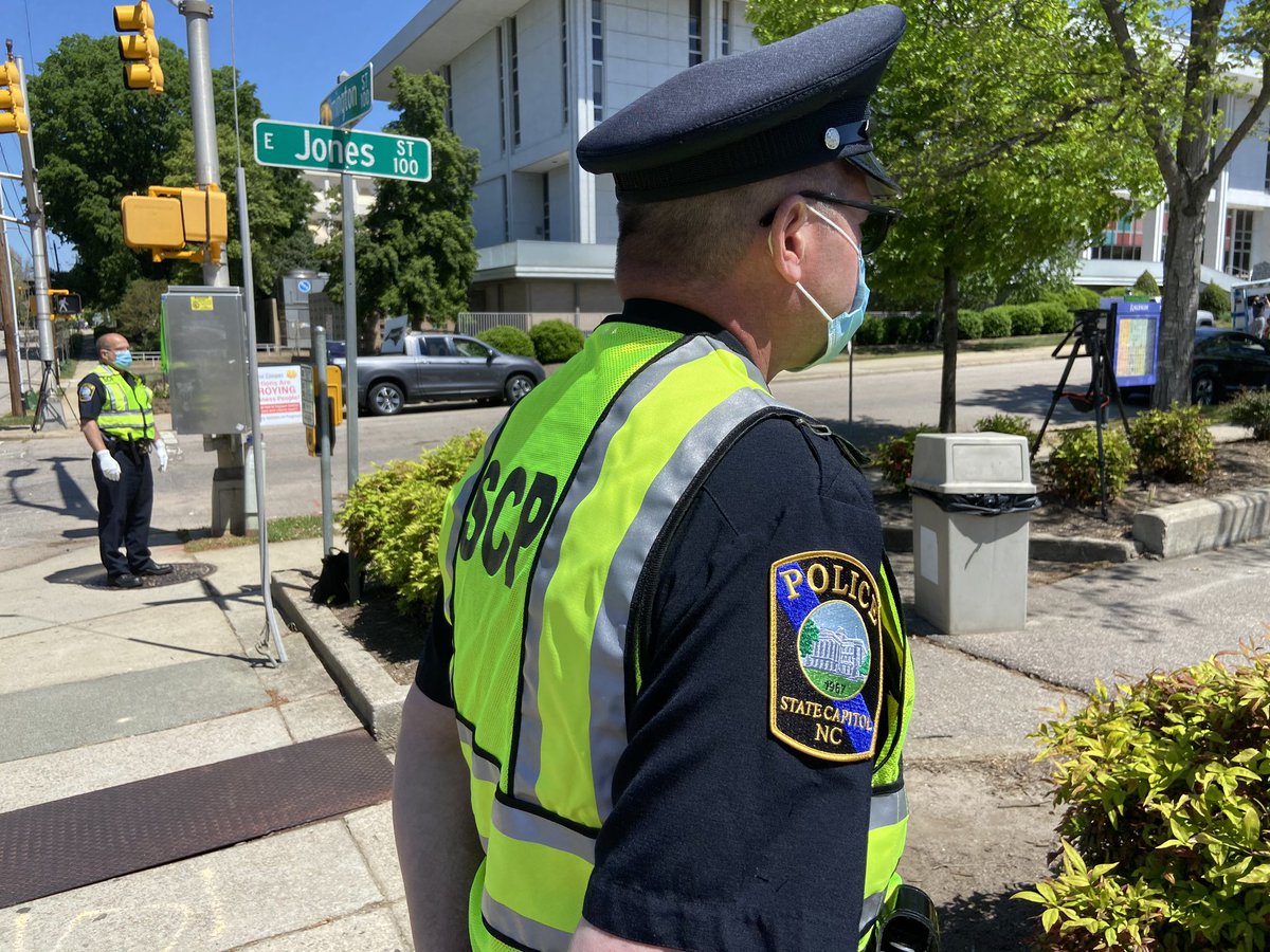 Third & final  @raleighpolice warning appears to working as much of the crowd disperses.  @WakeSheriff prison transports also arriving now, as officers also start walking through the parking lot and going to car to car.  @ABC11_WTVD  @ABCPolitics  @ABC  #abc11  #coronavirusNC