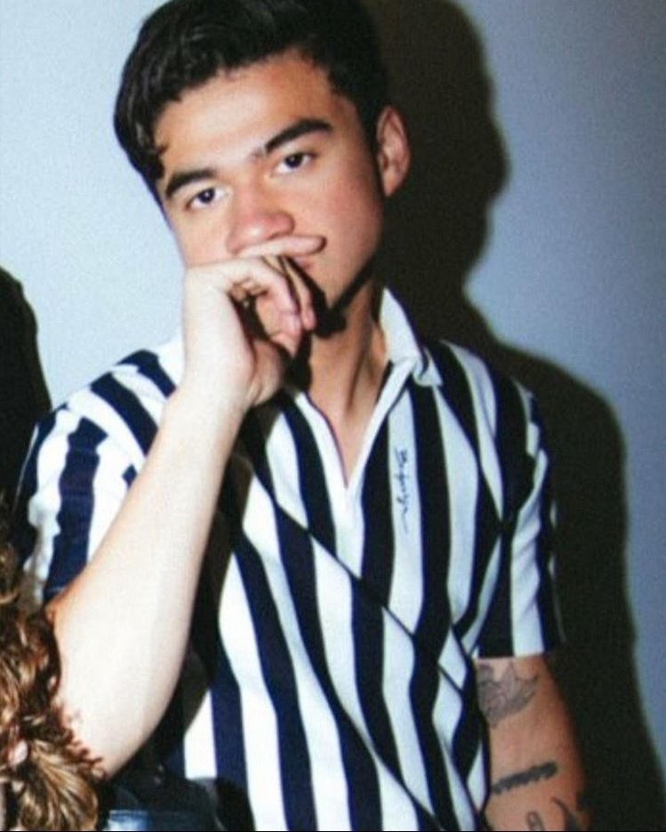 calum hood in stripes; a thread