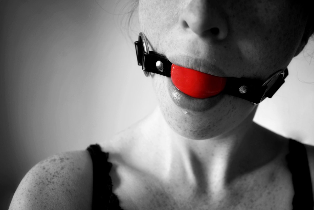 Ball gag tied up.