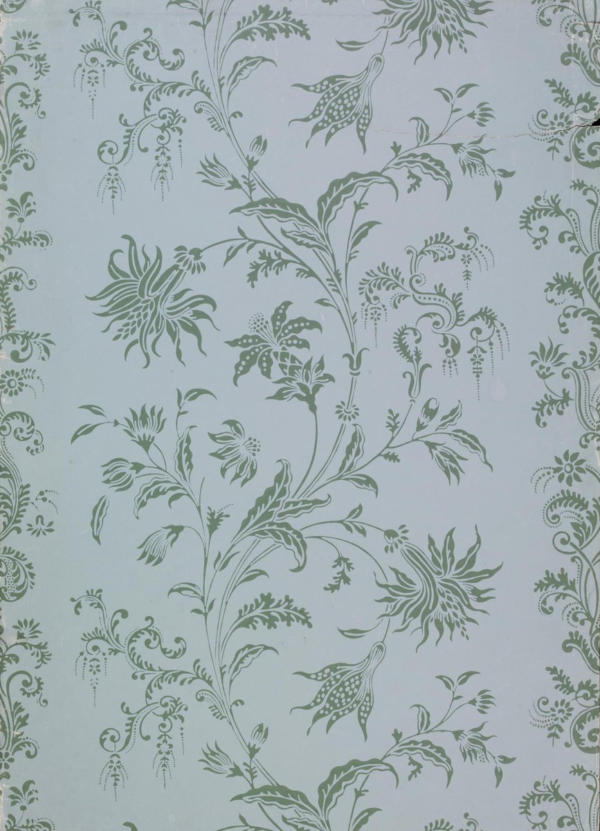 The larger samples held at the V&A give an idea of the full repeat: as well as the central loose meander of flower sprays, there is a tighter stripe of flower and leaf forms where the wallpaper strips would meet.
