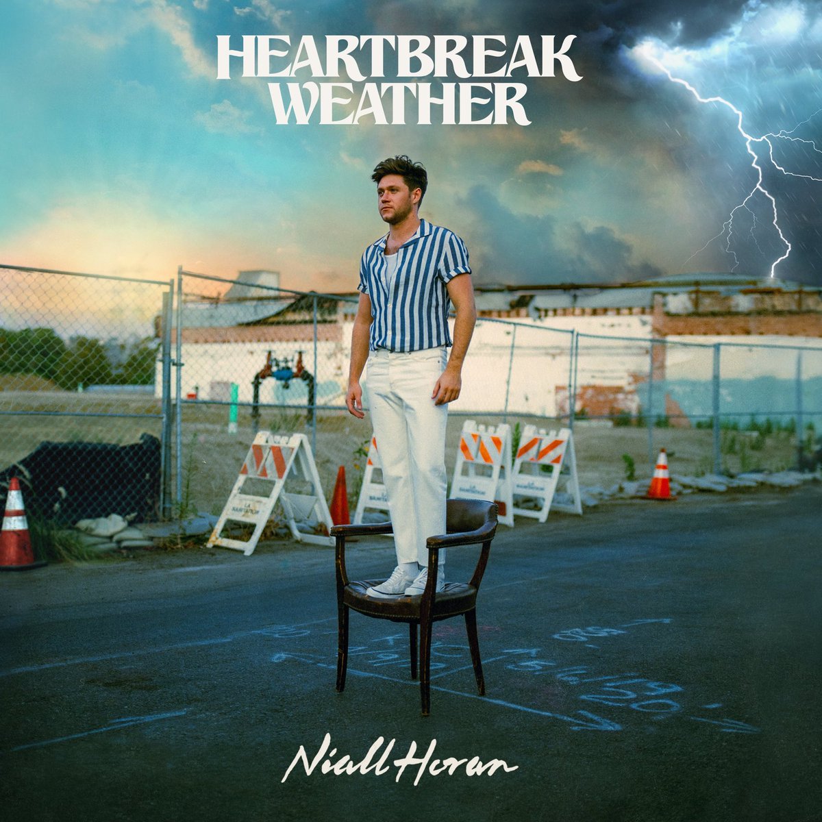 I want you to notice how Niall’s front picture of this album has a clear beautiful sky but then an electric storm and “do not pass” signs right behind him.  #HeartbreakWeather  