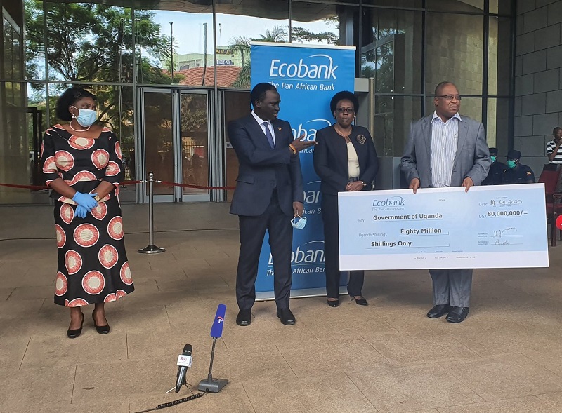 CEOEastAfrica's tweet photo. @EcobankUganda has today donated UGX80m (USD21,270) to Gov't of Uganda’s efforts to fight Covid-19. 
The bank’s Chairman, @KKariisa flanked by Mr. Clement Dodoo &amp; Ms. Annette Kihuguru, the MD and ED respectively, handed over the cheque to Hon. Mary Karooro Okurut. 👏
#StaySafeUG https://t.co/iSeVZVNxiD