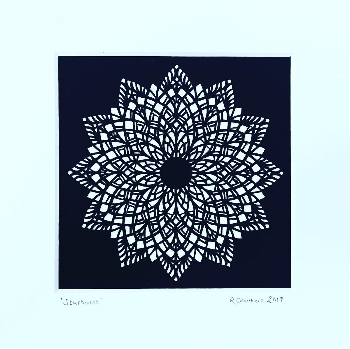 ChartamArt's tweet photo. Finally managed to frame up this little 4”x4” cut - ‘Starburst’ #lockdowncrafts #papercut #papercutting #guildofamericanpapercutters #scherenschnitte https://t.co/jfnKER4WHq
