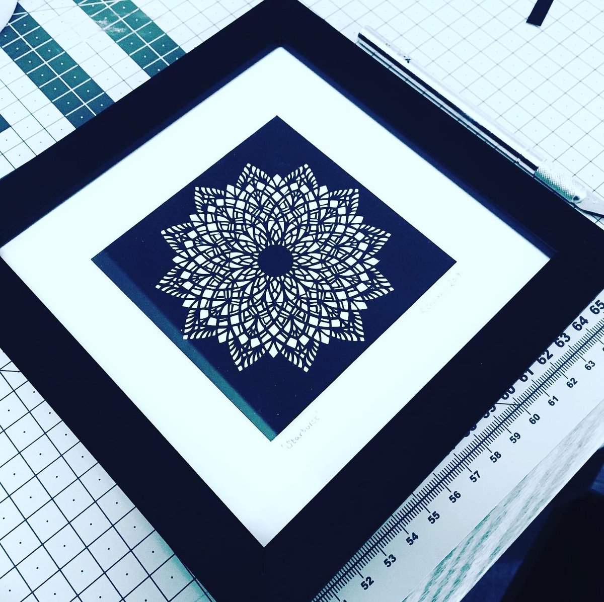 ChartamArt's tweet photo. Finally managed to frame up this little 4”x4” cut - ‘Starburst’ #lockdowncrafts #papercut #papercutting #guildofamericanpapercutters #scherenschnitte https://t.co/jfnKER4WHq