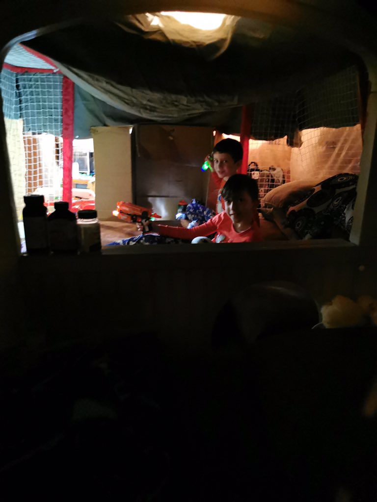 FFMfit's tweet photo. Brothers from @scorvese @Buchners1s classes find their calm in building a fort. @Self_Reg says that fort building makes kids feel safe. If there ever was a time to let kids build forts it’s now @FFMcGinnCES (let them create...take out all your blankets & pillows) #yougotthetime https://t.co/uQdB4WFRiq