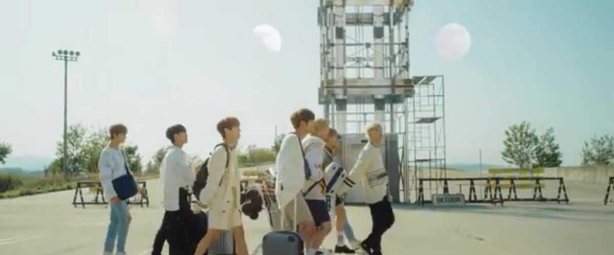 Here we can see two parallel words,one where they get in the bus, and one where they don't. You can also see that in the mv.Probably why there's two moons TMI:the cart seem to be the same one as in 19mv aka the song Han wrote in Cle1. You can see it with its ballons behind Felix