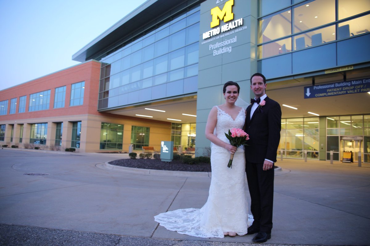UofMHealthWest's tweet photo. Congratulations to the newlyweds, Bradley &amp; Melanie! We wish you a lifetime of love and happiness! Hear their story on @WOODTV: https://t.co/XfIpvoIWdm

#Covidwedding #Hailtothecargivers https://t.co/GCScmNQBuc