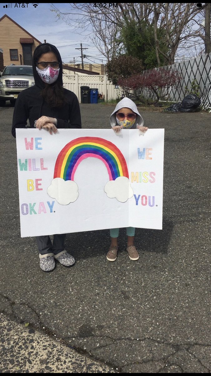 MrsRoensch's tweet photo. #wewillbeok these two sisters from #9 made a sign for us today!  Their mom made their masks!  @S9_Belleville https://t.co/LaneiYcMoM