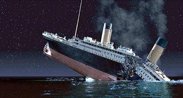 A roar is heard as the ship tears itself in two thanks to the huge weight of the stern out of the water. Not much of this is seen due to the sudden darkness. The stern plunges back to near level as the bow sinks. (0.01:00) /55  #Titanic108