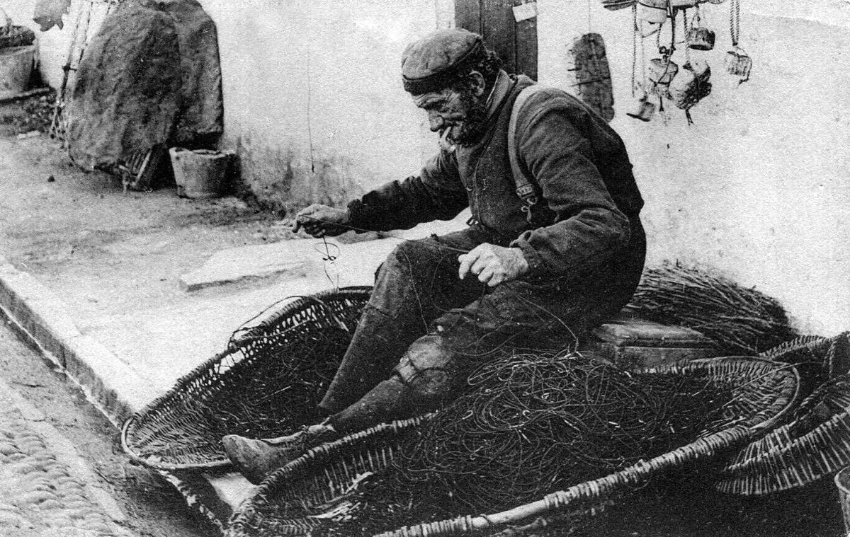 tourscotland's tweet image. Old Tour #Scotland Ancestry Travel visit Genealogy Scottish Family History Blog photograph of a fisherman mending #Creels outside his cottage in #Auchmithie and information and story of Creel fishing, also known as Potting tour-scotland-photographs.blogspot.com/2019/09/old-ph…