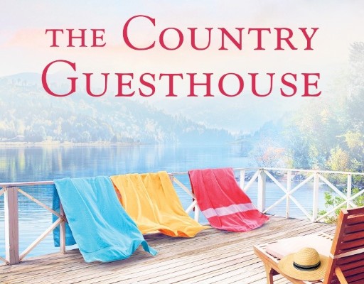 an illustration of a patio overlooking a lake with three towels laid out on a railing