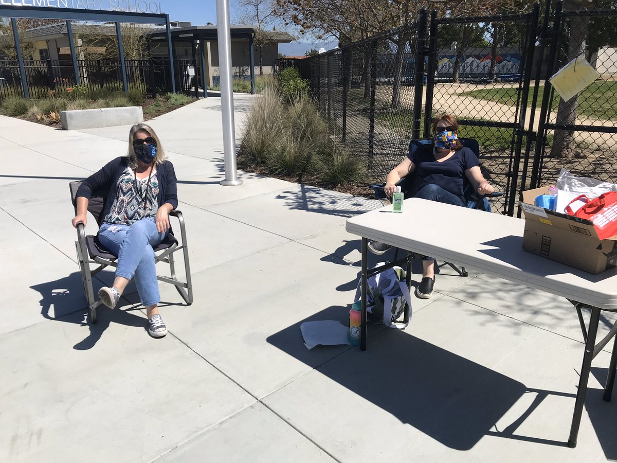 Our masked heroes, Kris and Christina, available for drive up meds! #usdlearns #guadroars