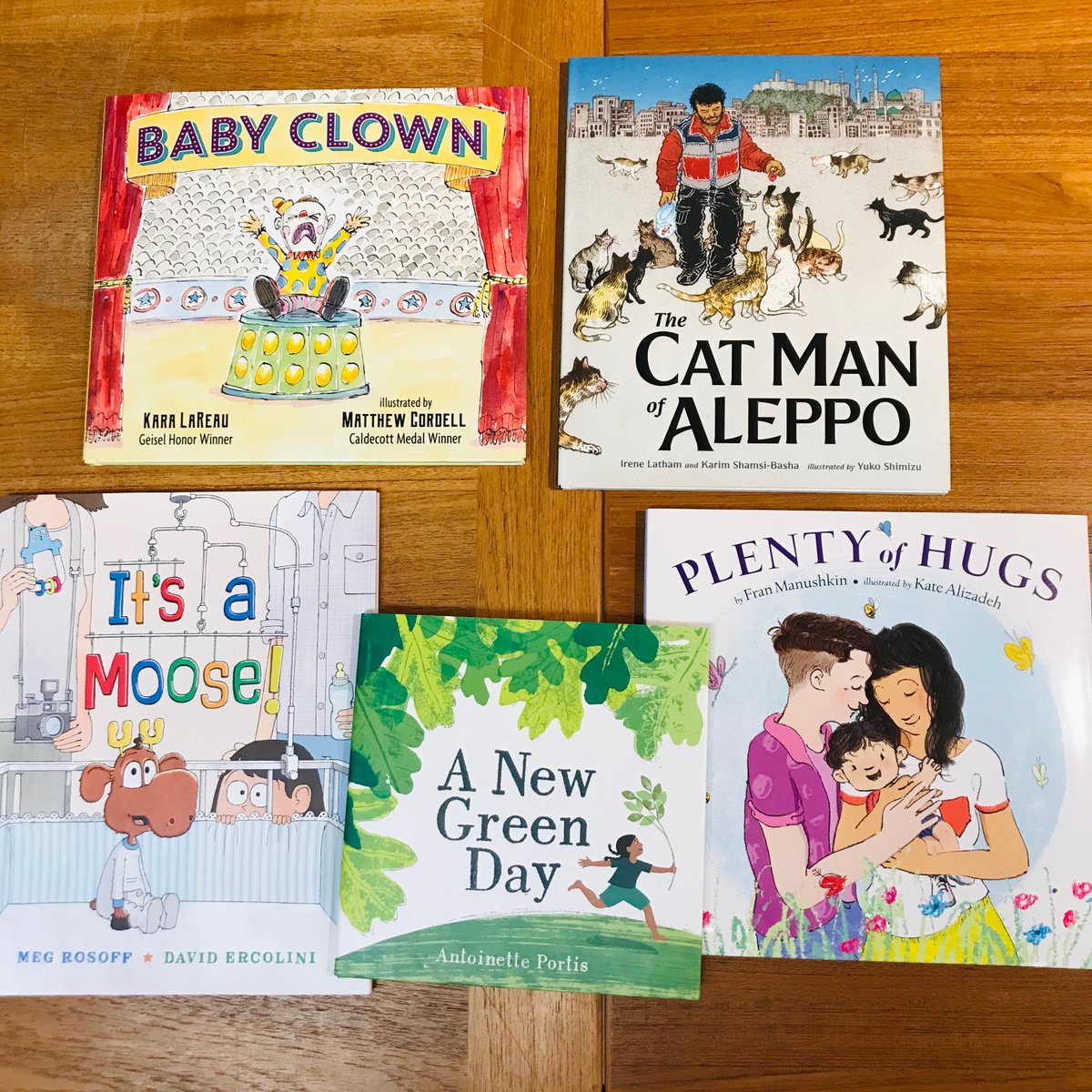 Picture books up first! BABY CLOWN by @karalareau, illus @cordellmatthew! IT'S A MOOSE by Meg Rosoff, illus David Ercolini! A NEW GREEN by @aportisa! THE CAT MAN OF ALEPPO by @Irene_Latham & @arabinalabama, illus @yukoart! PLENTY OF HUGS by @FranManushkin, illus @katealizadeh!