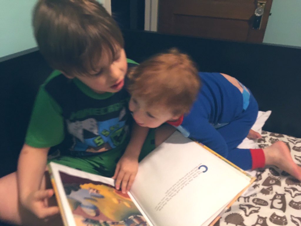 Family book time on this Time Capsule Tuesday! Gavin read us 'The Little Engine That Could' at bedtime tonight. ❤️📘🐛 #bookofgold #collsedu #tatemtweets #andersonsangels @OlsenFirst