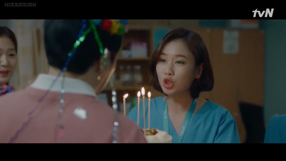 Green heart. The scene could be done w/o that poster/standee but they chose to put it there. In the this scene, Min-ha called. Then the next scene we got for SH was the team's birthday suprise with MH at the center. Coincidence? Hint? Ahhh, these details!  #HospitalPlaylist