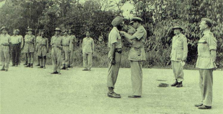 3Lord Mountbatten pins the DFC award on Squadron Leader Arjan Singh, No 1 Squadron RIAF, Burma, Second World War.