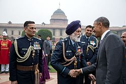 18Jan 2015: U.S. President Barack Obama greets Arjan Singh, Marshal of the Indian Air Force, in the forecourt of Rashtrapati Bhawan at India's annual republic day parade.