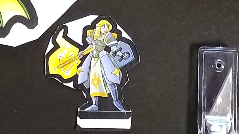My kid also chose this Cleric paper mini from Heros Pack 07 as her Knight "because it looks like Anna (from Frozen)". https://www.drivethrurpg.com/m/product/251264