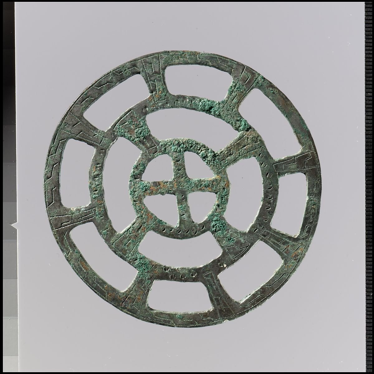 These examples are all in the Metropolitan Museum of Art, with a 7th - 8th century date. They are key rings, basically, hung from the belt, with tools, keys or ornaments hanging from the different loops. In some places, the wear marks are really clear. Copper alloy, often tinned.