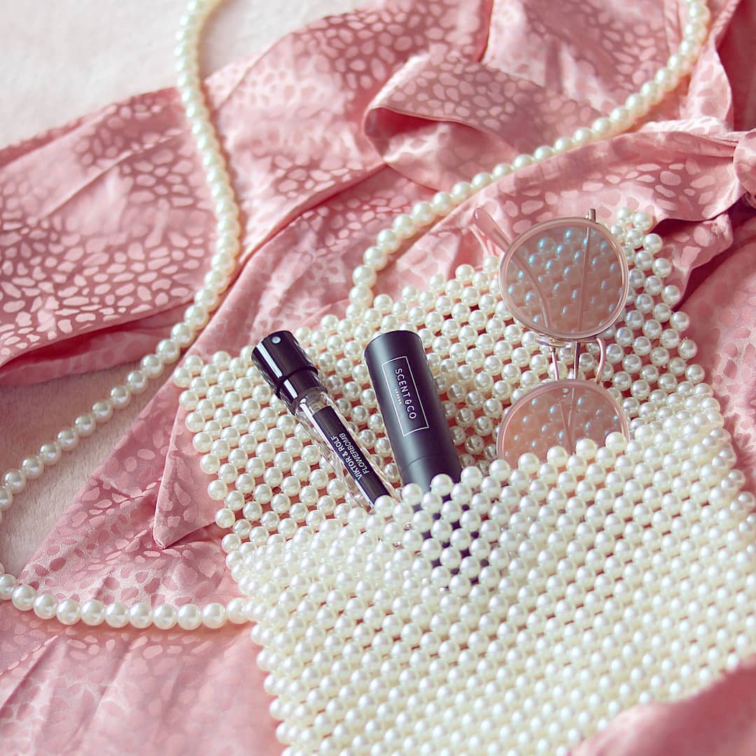 One of our Scentfluencers <a href="/lucyscarfe/">Lucy Scarfe</a> showcasing her "handbag es-scent-ials" with her perfect Spring scent Viktor and Rolf Flowerbomb 🌸 scentandco.uk