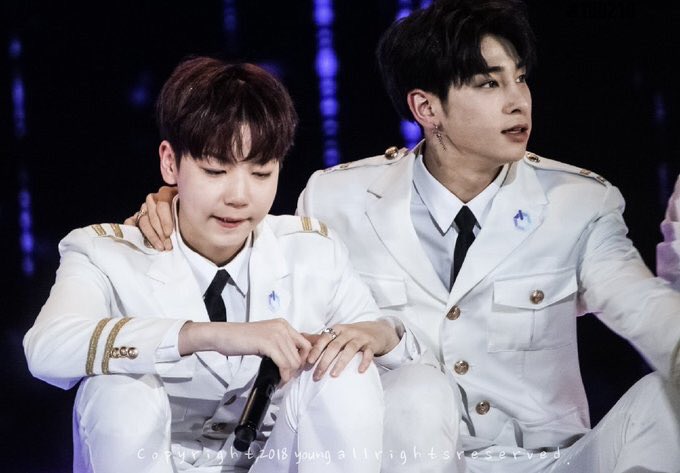 comforting his lil bro bcz he is sad for he was not able to debut with hangyul in the unit finals. he put up a strong face in front of kijoong this day