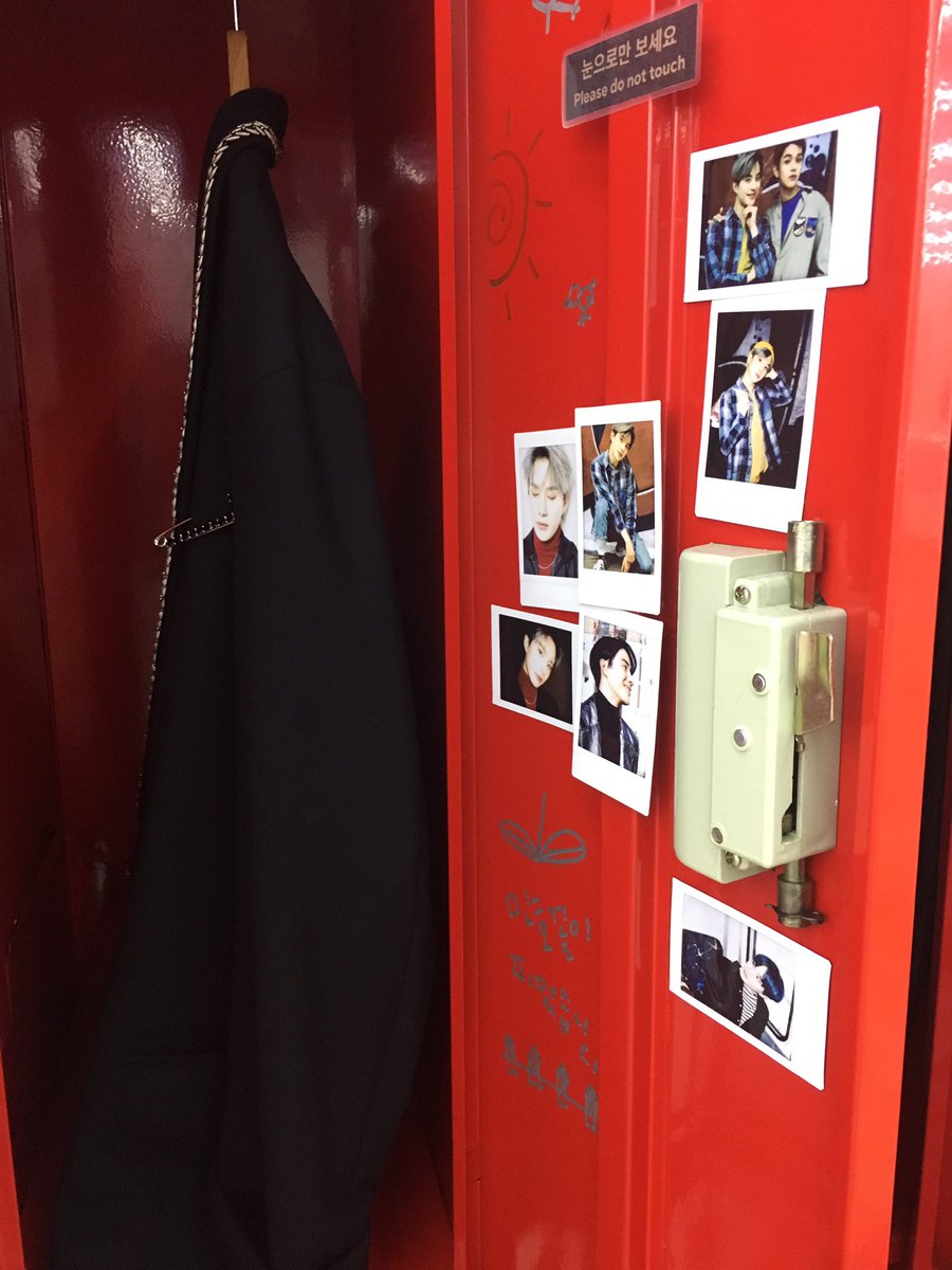the iconic smrookies lockers now have black on black outfits in them + polaroids. pretty cool