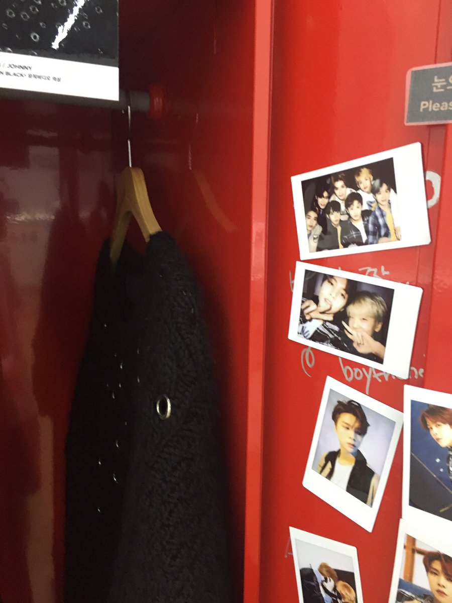 the iconic smrookies lockers now have black on black outfits in them + polaroids. pretty cool