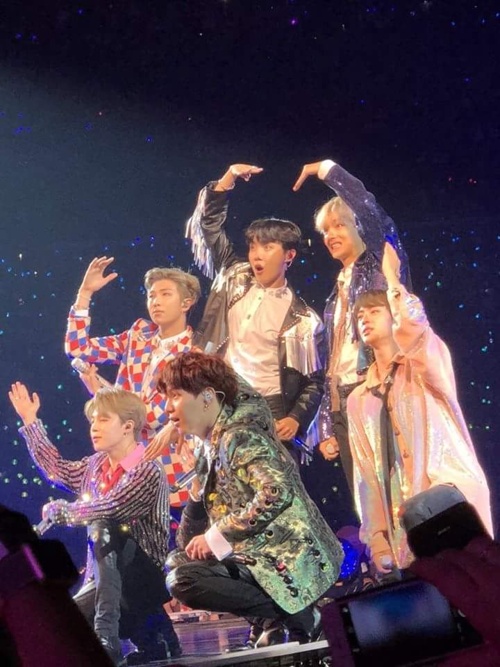 bts doing a heart pose; a messy thread