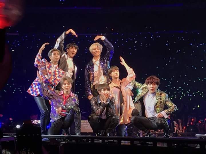 bts doing a heart pose; a messy thread