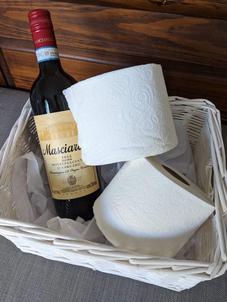 I made a welcome basket and wrote a note for our new neighbors moving in next door today. 
I remember when the wine would have been the most valuable thing in the basket....