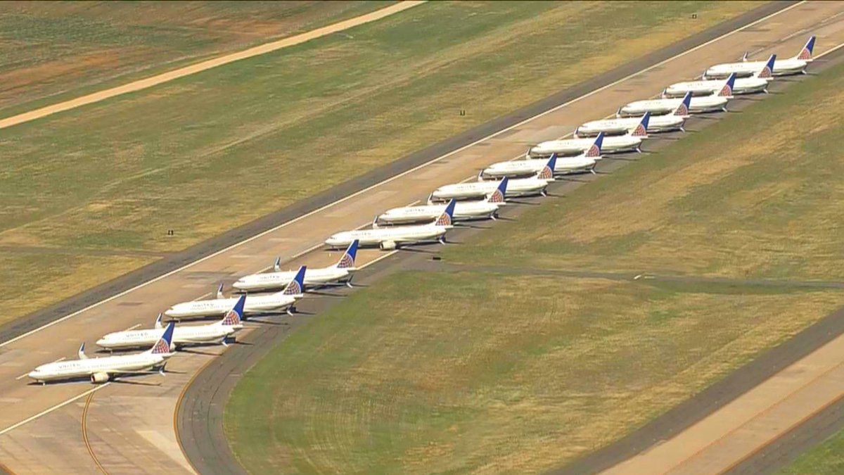 RobCBS4's tweet photo. Images from #Copter4 during flight over @DENAirport Tue 4-14-20. Dozens of aircraft parked as US domestic air travel is crushed by #coronavirus. Interesting to note passenger traffic is down around 95% from this time last year without any govt imposed restrictions on flying. https://t.co/DGG3rUC2Pn