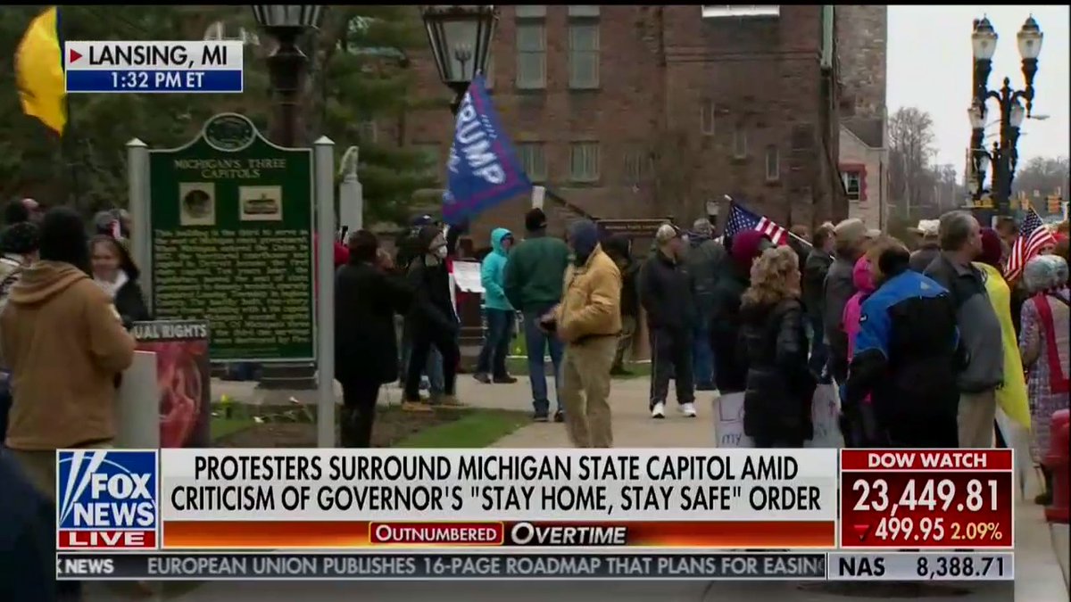 people are owning the libs by waving Trump flags at Michigan& #39;s pro-coronavirus rally