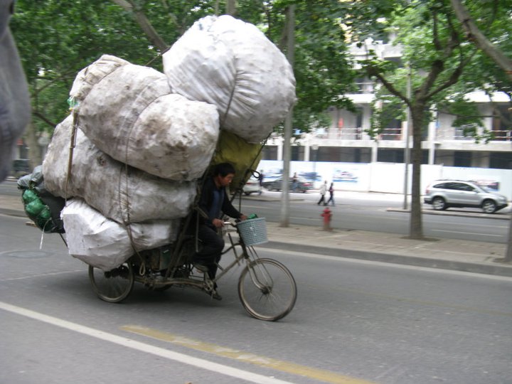 I've been going through some old China photos that make me smile, and wanted to start a thread here to share them with you all. I'll be posting ~1 per day to this thread.First one: Recycling guy on his bike, Xi'an 友谊路, 2010