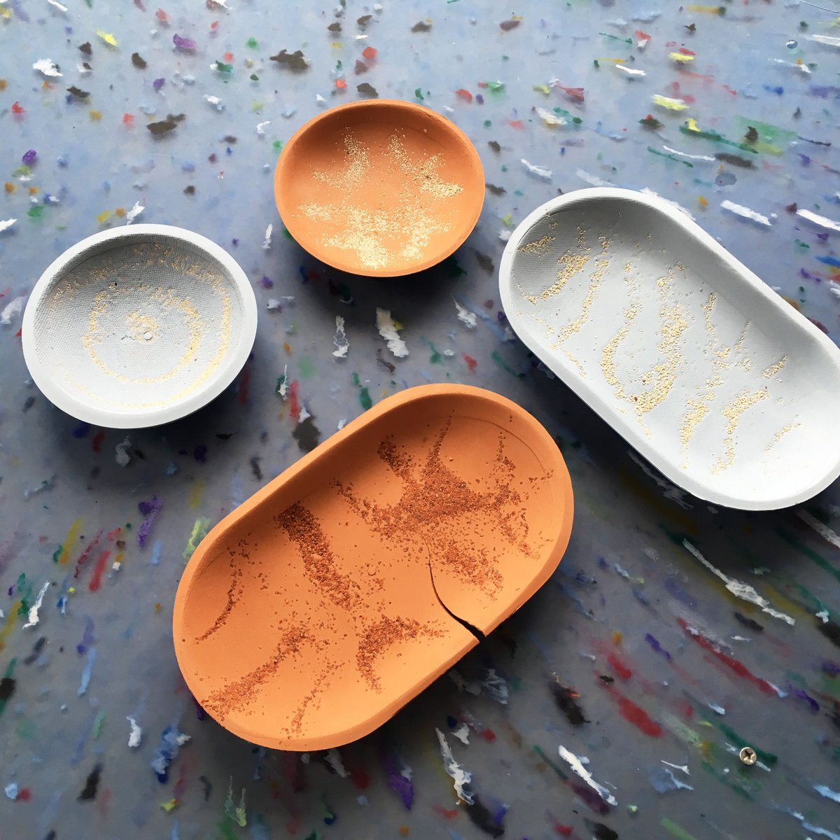 Fresh off the kiln. 😎 First plates created with resonance pattern - bisque fired and waiting to get glazed.
#workinprogress
#blueearthenware
#terracotta
#newcollection