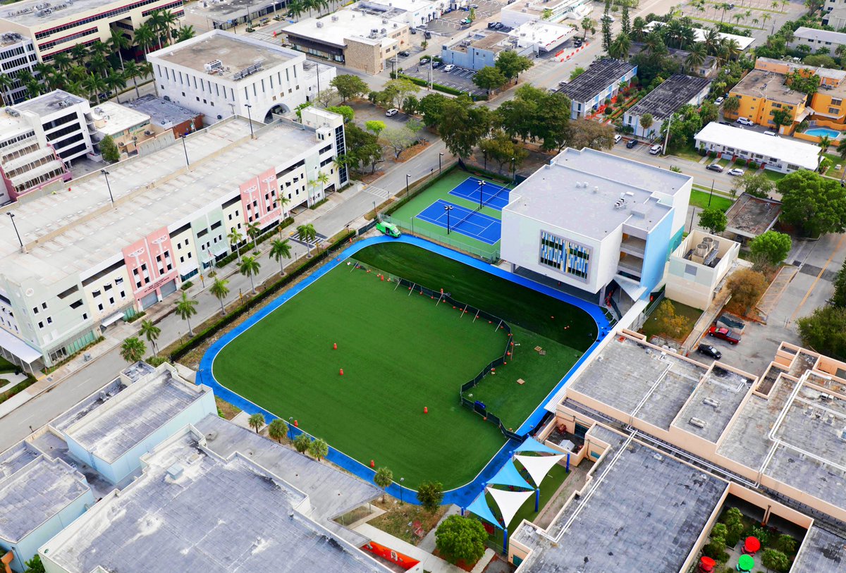 MDCPSCapital's tweet photo. Our facilities are closed for instruction but open for construction! #buildingthefuture ❣️ Good afternoon #Miami #DroneView of @RKBBHK8 #GOBprogress project compleated by @LinkConstGroup can you spot the covered #basketball courts? #EssentialWorkers https://t.co/7c5PBeL2gZ